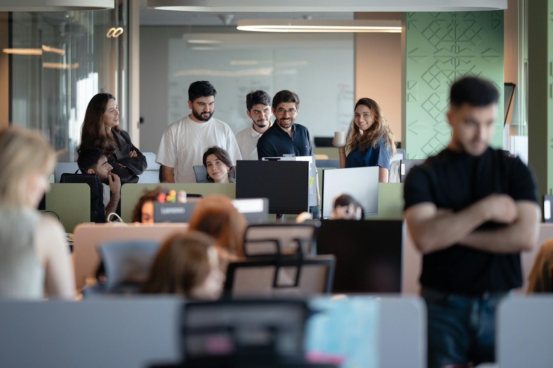 Tech Experts Collaborating in Office